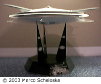 [Side view, on stand]