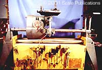 [Perhaps if you formed a rudimentary lathe ....]